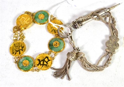 Lot 302 - An Oriental green coloured hardstone bracelet, clasp stamped '18'; together with a white metal...
