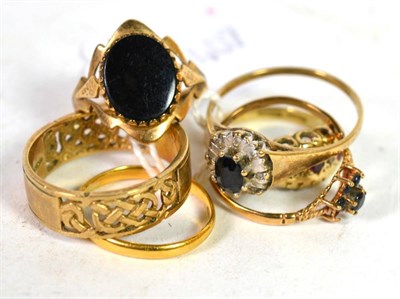 Lot 319 - Five 9 carat gold rings including a band ring with pierced decoration, finger size T1/2; an...