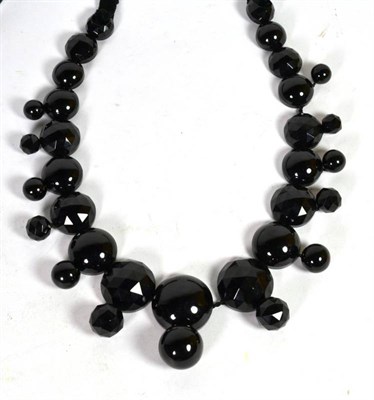 Lot 322 - A Victorian black jet faceted and half cabochon linked necklace