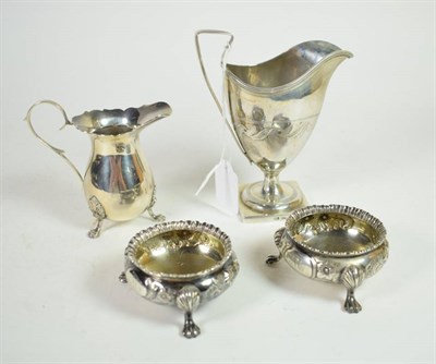 Lot 327 - A George III silver pedestal cream jug, makers mark TL, Sheffield 1802; a pair of Victorian...