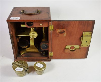 Lot 336 - A mahogany carved microscope and two sets of pewter scales