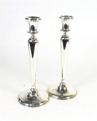 Lot 348 - A pair of American silver candlesticks, Ellmore Silver Co, Meriden, Connecticut, mid 20th...