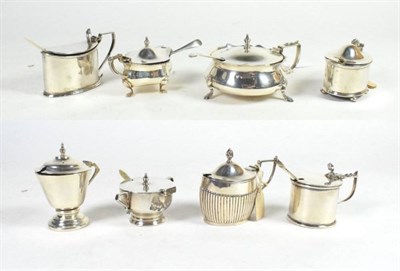 Lot 350 - A collection of nine various silver mustard pots, various makers, late 19th and 20th century,...
