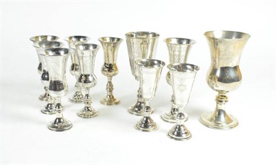 Lot 351 - A group of eleven various silver Kiddish cups, various dates and makers, the largest 12.5cm...