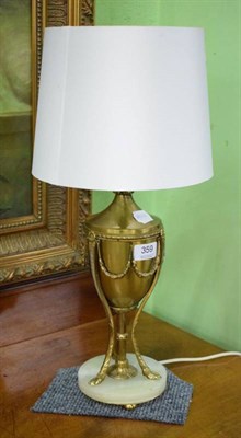Lot 359 - A gilt metal and onyx table lamp