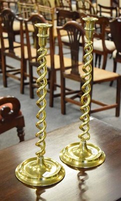 Lot 366 - Two large brass candlesticks, of double helix form (2)