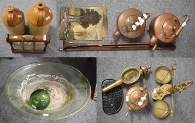 Lot 1039 - An LNER cast iron locomotion plaque; an oak tantalus; witches ball; copper kettles; silver collared