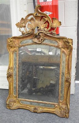 Lot 1148 - A 18th century gilt framed mirror in the rococo taste