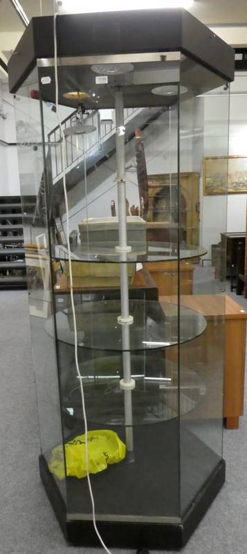 Lot 1156 - A hexagonal revolving display cabinet