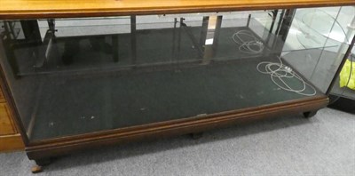 Lot 1157 - A mirrored and glazed display cabinet