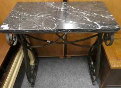 Lot 1169 - A marble topped side table with wrought iron base