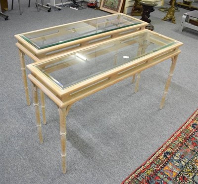 Lot 1172 - A pair of modern glass topped faux bamboo hall tables