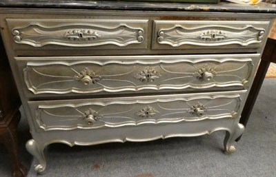 Lot 1174 - A 19th century French style silver painted marble topped three-height commode (a.f.)