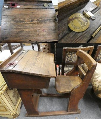 Lot 1180 - A Victorian pitch pine and elm school desk with sliding mechanism, by repute used by the artist...