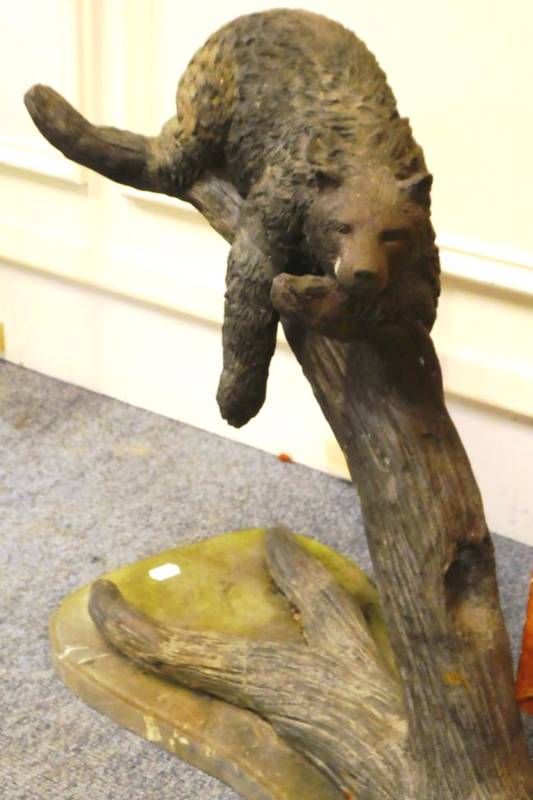 Lot 1190 - A bronze bear on a branch