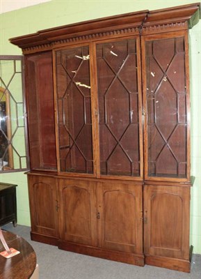 Lot 1206 - A 19th century mahogany breakfront bookcase