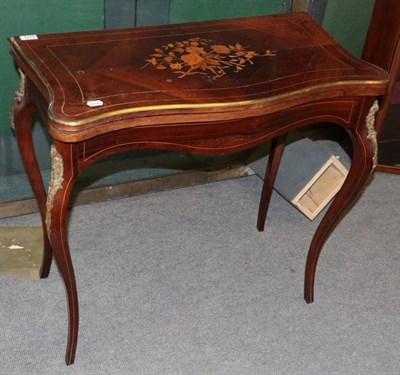 Lot 1218 - Louis XV style rosewood and marquetry inlaid fold over card table, gilt-metal mounts, cabriole...