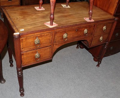 Lot 1225 - A Regency mahogany and crossbanded kneehole sideboard, the central drawer flanked by two...