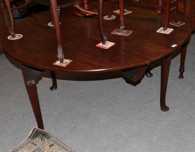 Lot 1226 - George III mahogany six seater gateleg table