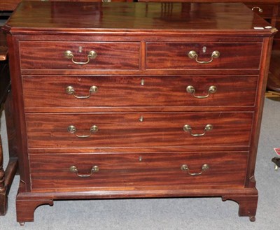 Lot 1231 - George III mahogany chest with canted stiles