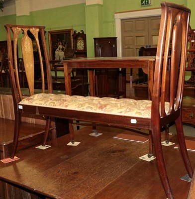 Lot 1232 - Edwardian mahogany and marquetry inlaid two-seater window seat, circa 1900, buttoned...