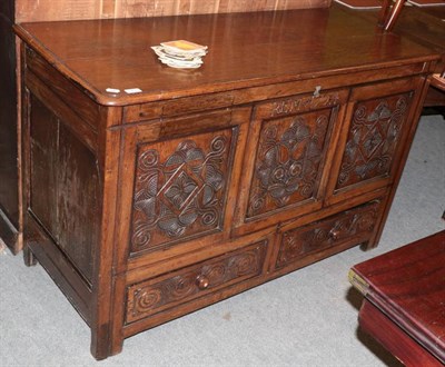 Lot 1233 - An 18th century oak chest dated 1724 with hinged lid