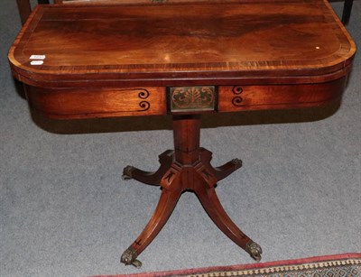 Lot 1237 - Regency mahogany rosewood and satinwood crossbanded fold-over card table