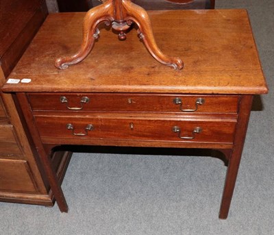 Lot 1239 - A mahogany low boy fitted with two drawers