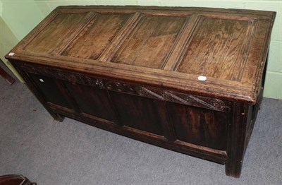 Lot 1240 - A 17th century oak four panel coffer, carved T.B 1683, 141cm width