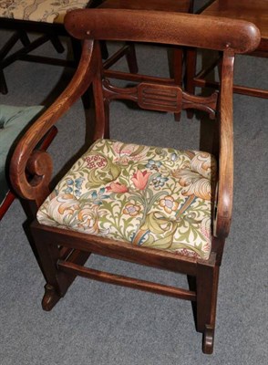 Lot 1255 - Late George III oak rocking chair (adapted)