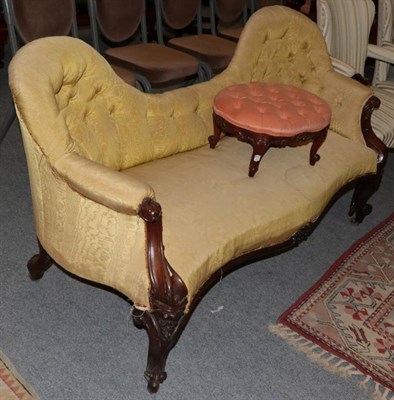 Lot 1257 - Victorian carved mahogany sofa upholstered in buttoned and watered silk fabric