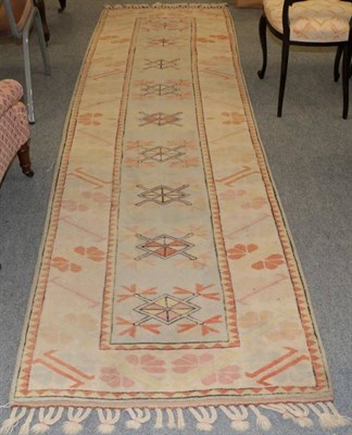 Lot 1260 - Narrow Melas Runner, West Anatolia, the ice blue field with a column of diamond medallions enclosed