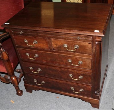 Lot 1281 - Mahogany chest of small proportions with two short and three long drawers and a brushing slide