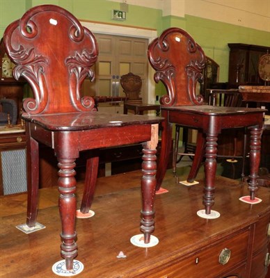 Lot 1285 - Pair of Victorian mahogany hall chairs