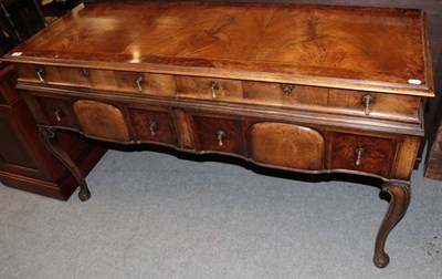 Lot 1291 - A 1920's walnut cross-banded and feather-banded side board