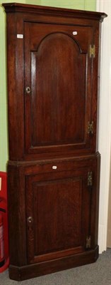 Lot 1305 - George III full height oak corner cupboard