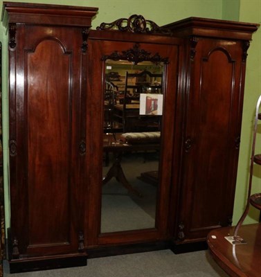 Lot 1310 - A Victorian mahogany breakfront wardrobe