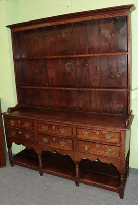 Lot 1311 - A George III oak dresser and rack (with original purchase receipt)