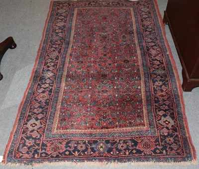 Lot 1266A - A Bidjar rug, Iranian Kurdistan, circa 1910, the indigo Herati field enclosed by madder borders and