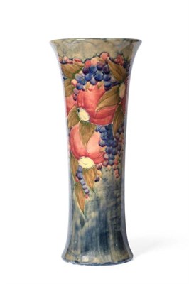Lot 221 - William Moorcroft (1872-1945): An Open Pomegranate Pattern Trumpet Vase, on a blue/green wash...