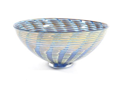 Lot 243 - A Kosta Boda Peacock Swirl Glass Bowl, by Bertil Vallien, yellow, blue and clear glass, signed...
