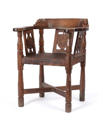 Lot 265 - Mouseman: A 1930's Robert Thompson of Kilburn English Oak Monk's Chair, with curved back each...
