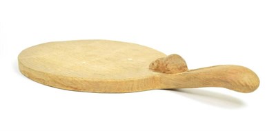 Lot 308 - Mouseman: A Robert Thompson of Kilburn English Oak Cheese Board, with carved mouse signature on the