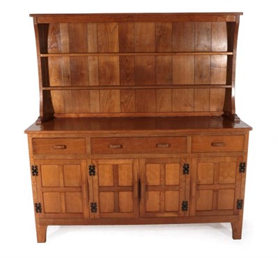 Lot 315 - Acorn Industries: A G.J.Grainger and Sons of Brandsby Panelled English Oak Welsh Dresser, the plate
