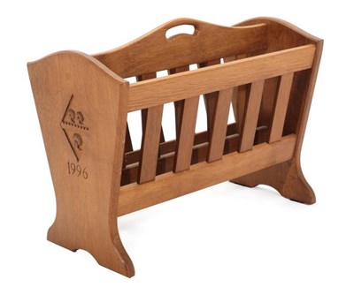 Lot 323 - Acorn Industries: A G.J.Grainger and Sons of Brandsby English Oak Magazine Rack, the shaped...