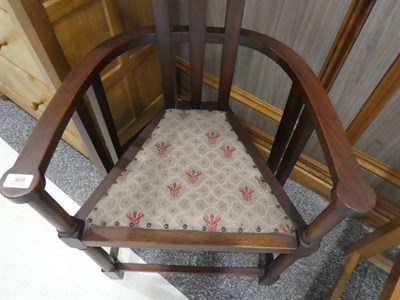 Lot 368 - An Art Nouveau Mahogany Armchair, the full rail back joined to a triangular shaped seat,...