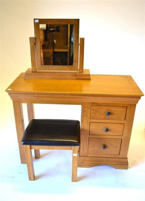 Lot 375 - An Oak Dressing Table, modern, of rectangular form with three drawers, 106cm by 48.5cm by 76cm;...