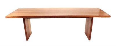 Lot 376 - A Solid Teak Rectangular Dining Table, modern, on square form supports joined by a peg, 250cm...