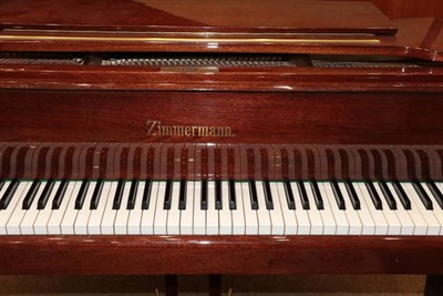 Lot 377 - A Zimmerman Baby Grand Piano, model 399356, modern, on square tapering legs with brass capped...