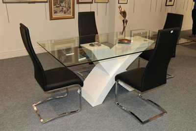 Lot 379 - A Glass Top Dining Table and Four Chairs, modern, the rectangular plate glass top above a white...